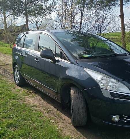 Синий Пежо 5008, объемом двигателя 1.6 л и пробегом 267 тыс. км за 9200 $, фото 1 на Automoto.ua