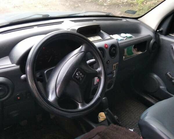 Синий Пежо Partner, объемом двигателя 1.9 л и пробегом 300 тыс. км за 3900 $, фото 1 на Automoto.ua