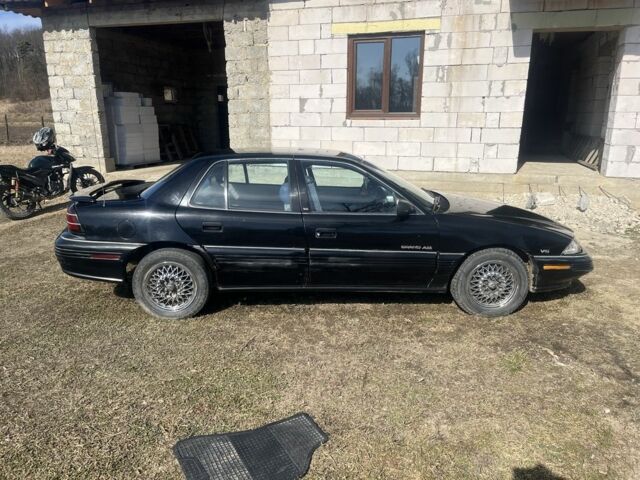 Черный Понтиак Гранд АМ, объемом двигателя 3.3 л и пробегом 204 тыс. км за 3269 $, фото 1 на Automoto.ua