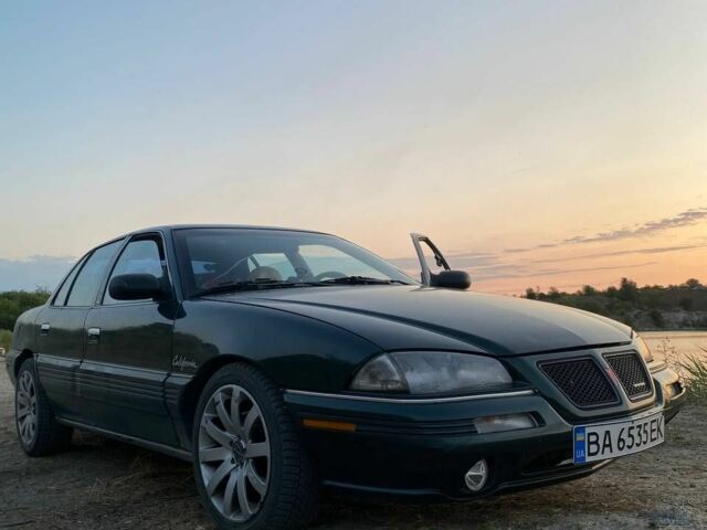 Зеленый Понтиак Гранд АМ, объемом двигателя 2.3 л и пробегом 214 тыс. км за 5500 $, фото 1 на Automoto.ua