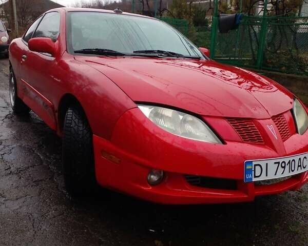 Красный Понтиак Санфаер, объемом двигателя 2.19 л и пробегом 250 тыс. км за 3300 $, фото 1 на Automoto.ua