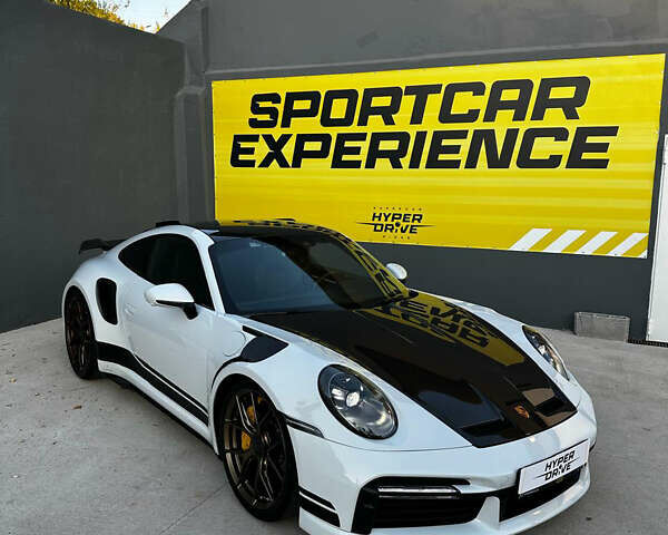 Белый Порше 911, объемом двигателя 3.75 л и пробегом 50 тыс. км за 350000 $, фото 1 на Automoto.ua