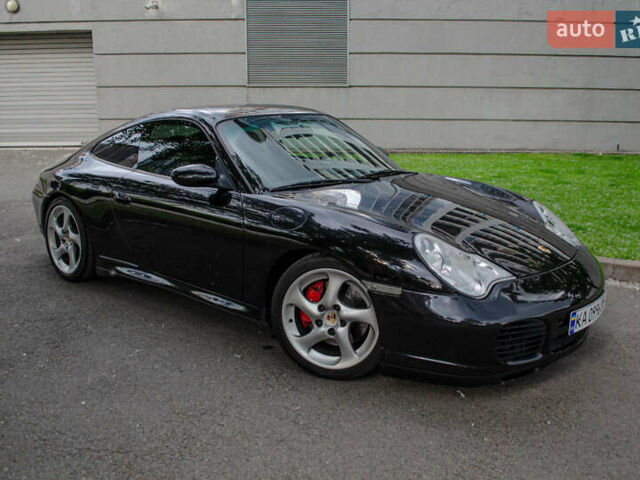 Черный Порше 911, объемом двигателя 3.6 л и пробегом 110 тыс. км за 41000 $, фото 1 на Automoto.ua
