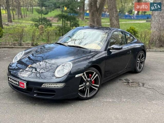 Черный Порше 911, объемом двигателя 3.8 л и пробегом 39 тыс. км за 59990 $, фото 1 на Automoto.ua