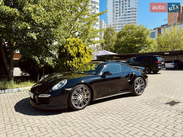 Черный Порше 911, объемом двигателя 3.8 л и пробегом 53 тыс. км за 123000 $, фото 1 на Automoto.ua