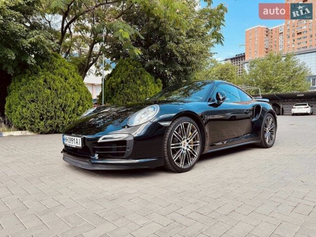 Черный Порше 911, объемом двигателя 3.8 л и пробегом 53 тыс. км за 125000 $, фото 1 на Automoto.ua