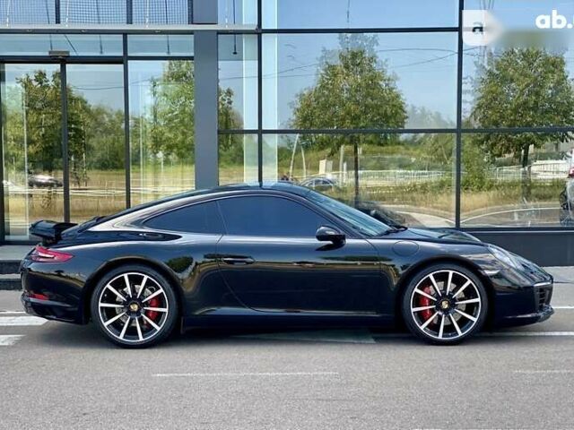 Черный Порше 911, объемом двигателя 3 л и пробегом 36 тыс. км за 74999 $, фото 1 на Automoto.ua