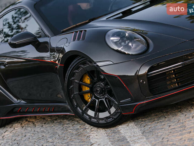 Черный Порше 911, объемом двигателя 3.75 л и пробегом 7 тыс. км за 410000 $, фото 1 на Automoto.ua