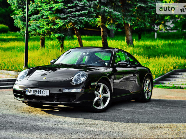 Черный Порше 911, объемом двигателя 3.6 л и пробегом 117 тыс. км за 37500 $, фото 1 на Automoto.ua