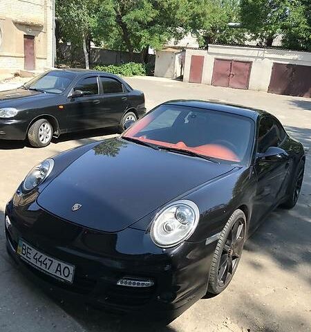 Черный Порше 911, объемом двигателя 3.8 л и пробегом 45 тыс. км за 48000 $, фото 1 на Automoto.ua