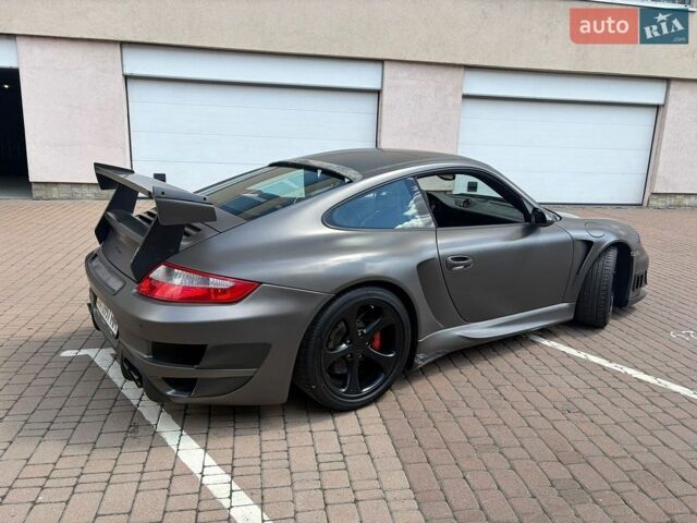 Серый Порше 911, объемом двигателя 3.8 л и пробегом 23 тыс. км за 94900 $, фото 1 на Automoto.ua