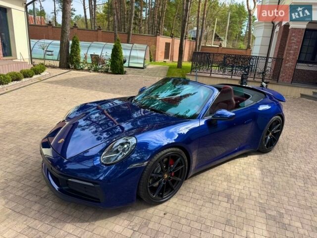 Синий Порше 911, объемом двигателя 3 л и пробегом 60 тыс. км за 118000 $, фото 1 на Automoto.ua