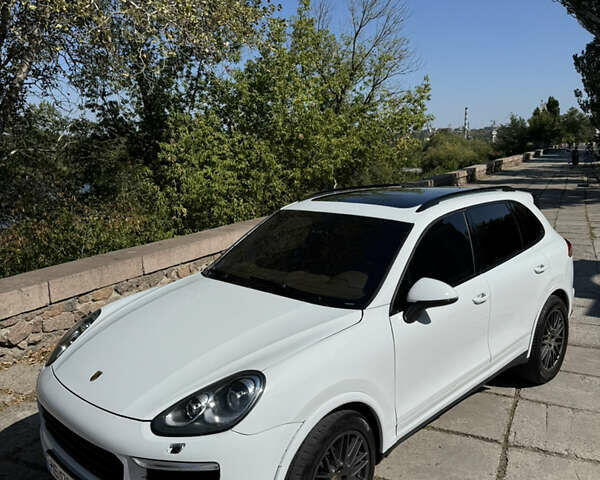 Белый Порше Каен, объемом двигателя 3.6 л и пробегом 115 тыс. км за 27000 $, фото 1 на Automoto.ua
