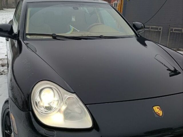 Черный Порше Каен, объемом двигателя 4.8 л и пробегом 150 тыс. км за 10369 $, фото 1 на Automoto.ua