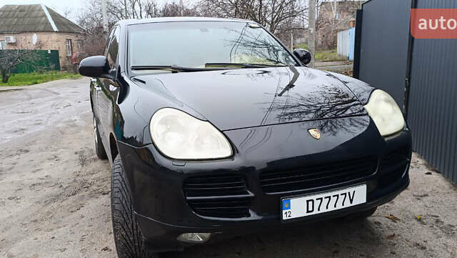 Черный Порше Каен, объемом двигателя 4.5 л и пробегом 240 тыс. км за 6700 $, фото 1 на Automoto.ua