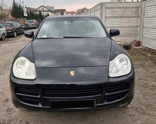 Черный Порше Каен, объемом двигателя 4.5 л и пробегом 206 тыс. км за 8500 $, фото 1 на Automoto.ua