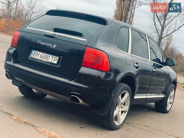 Черный Порше Каен, объемом двигателя 4.5 л и пробегом 200 тыс. км за 15000 $, фото 1 на Automoto.ua