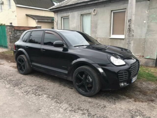 Черный Порше Каен, объемом двигателя 4.5 л и пробегом 212 тыс. км за 6300 $, фото 1 на Automoto.ua