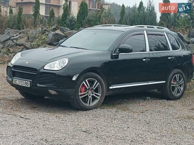 Черный Порше Каен, объемом двигателя 4.51 л и пробегом 208 тыс. км за 4800 $, фото 1 на Automoto.ua