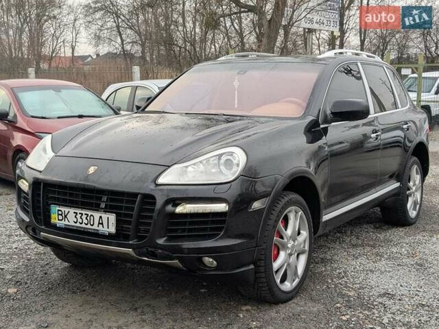 Черный Порше Каен, объемом двигателя 4.8 л и пробегом 120 тыс. км за 10950 $, фото 1 на Automoto.ua