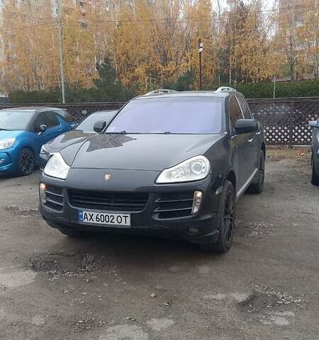 Черный Порше Каен, объемом двигателя 4.8 л и пробегом 170 тыс. км за 10400 $, фото 1 на Automoto.ua