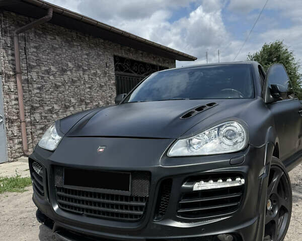 Черный Порше Каен, объемом двигателя 4.81 л и пробегом 178 тыс. км за 9431 $, фото 1 на Automoto.ua
