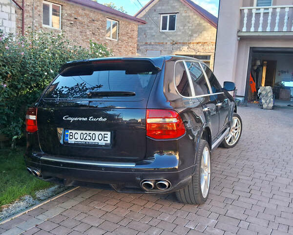 Чорний Порше Cayenne, об'ємом двигуна 4.81 л та пробігом 221 тис. км за 10600 $, фото 1 на Automoto.ua