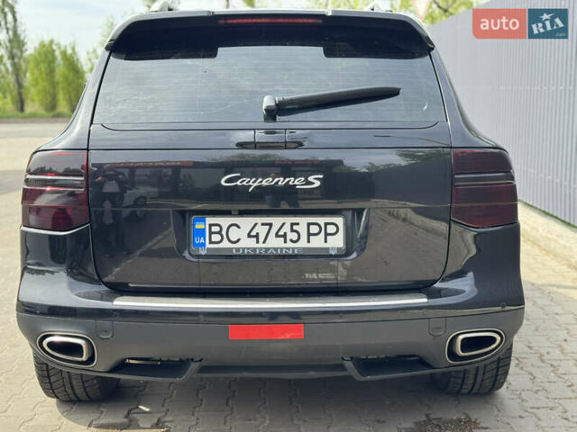 Черный Порше Каен, объемом двигателя 4.8 л и пробегом 203 тыс. км за 11500 $, фото 1 на Automoto.ua