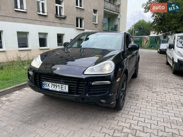 Черный Порше Каен, объемом двигателя 4.81 л и пробегом 148 тыс. км за 9000 $, фото 1 на Automoto.ua