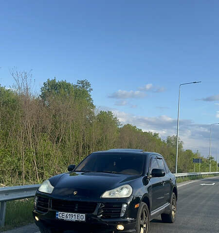 Черный Порше Каен, объемом двигателя 4.8 л и пробегом 247 тыс. км за 6700 $, фото 1 на Automoto.ua