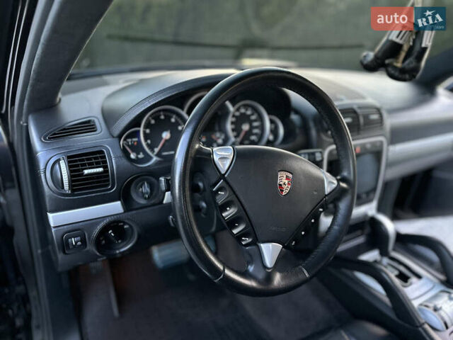 Черный Порше Каен, объемом двигателя 4.8 л и пробегом 145 тыс. км за 15700 $, фото 1 на Automoto.ua