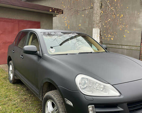 Черный Порше Каен, объемом двигателя 3.6 л и пробегом 245 тыс. км за 13500 $, фото 1 на Automoto.ua