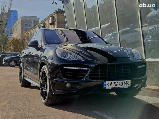 Черный Порше Каен, объемом двигателя 4.8 л и пробегом 105 тыс. км за 25900 $, фото 1 на Automoto.ua