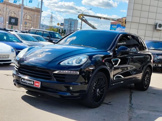 Черный Порше Каен, объемом двигателя 4.8 л и пробегом 141 тыс. км за 22990 $, фото 1 на Automoto.ua