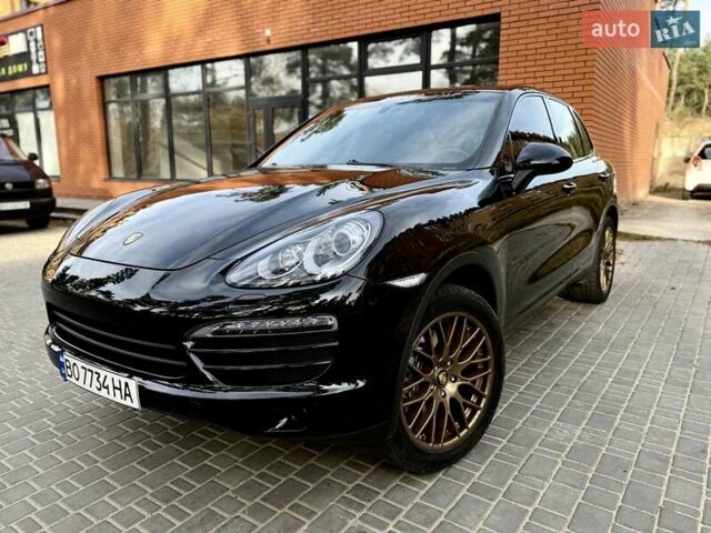 Черный Порше Каен, объемом двигателя 3.6 л и пробегом 155 тыс. км за 16900 $, фото 1 на Automoto.ua