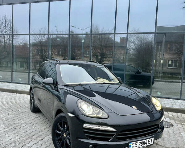 Черный Порше Каен, объемом двигателя 2.97 л и пробегом 302 тыс. км за 18000 $, фото 1 на Automoto.ua
