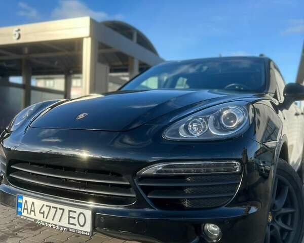 Черный Порше Каен, объемом двигателя 4.81 л и пробегом 116 тыс. км за 21000 $, фото 1 на Automoto.ua