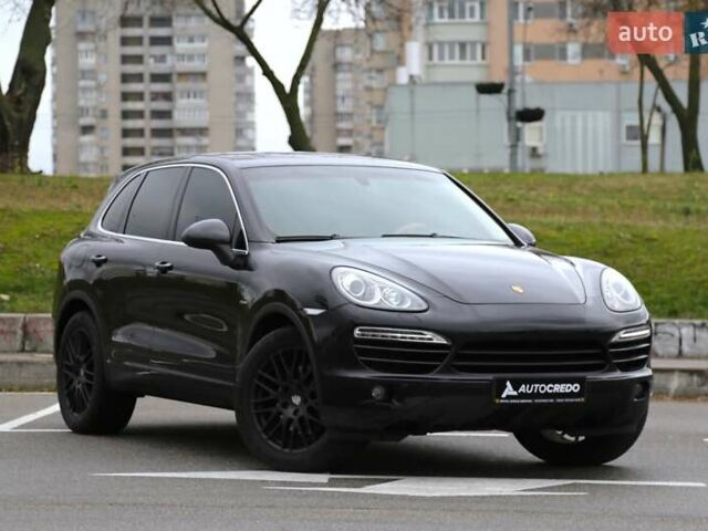 Черный Порше Каен, объемом двигателя 3 л и пробегом 103 тыс. км за 32000 $, фото 1 на Automoto.ua