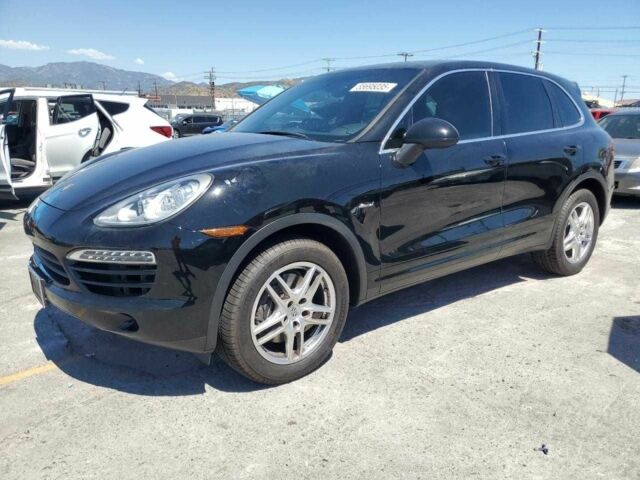 Черный Порше Каен, объемом двигателя 3 л и пробегом 74 тыс. км за 4000 $, фото 1 на Automoto.ua