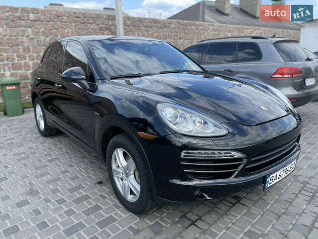 Черный Порше Каен, объемом двигателя 3 л и пробегом 215 тыс. км за 18000 $, фото 1 на Automoto.ua