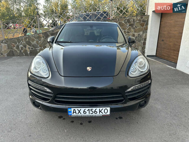 Черный Порше Каен, объемом двигателя 3 л и пробегом 142 тыс. км за 25000 $, фото 1 на Automoto.ua