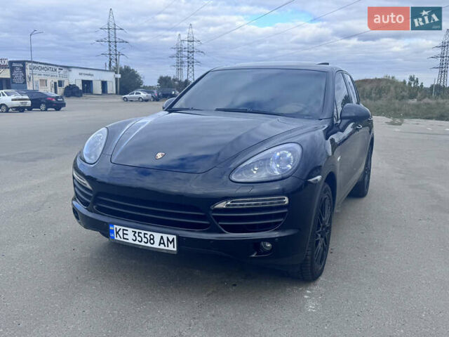 Черный Порше Каен, объемом двигателя 3 л и пробегом 169 тыс. км за 21400 $, фото 1 на Automoto.ua