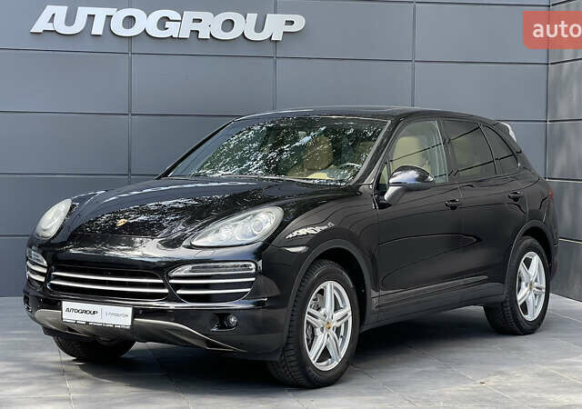 Черный Порше Каен, объемом двигателя 3.6 л и пробегом 124 тыс. км за 25800 $, фото 1 на Automoto.ua