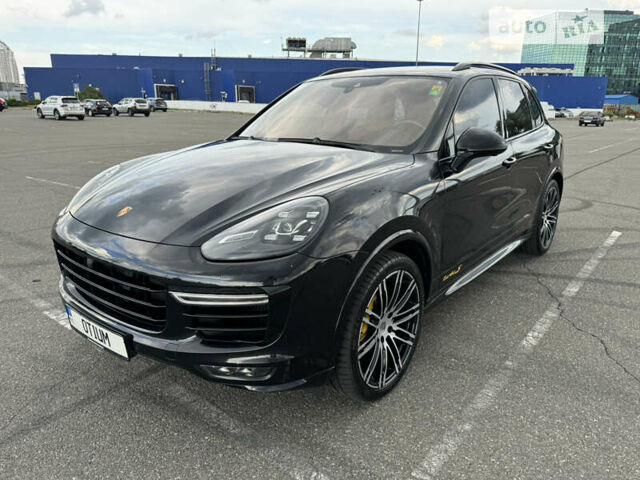 Черный Порше Каен, объемом двигателя 4.81 л и пробегом 100 тыс. км за 51000 $, фото 1 на Automoto.ua