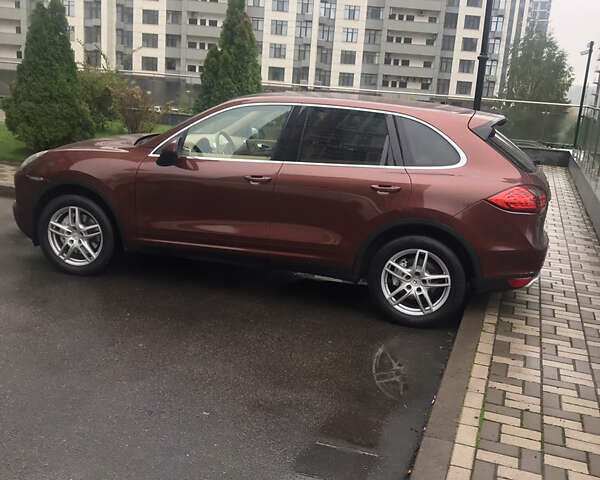 Коричневий Порше Cayenne, об'ємом двигуна 4.81 л та пробігом 142 тис. км за 18000 $, фото 1 на Automoto.ua