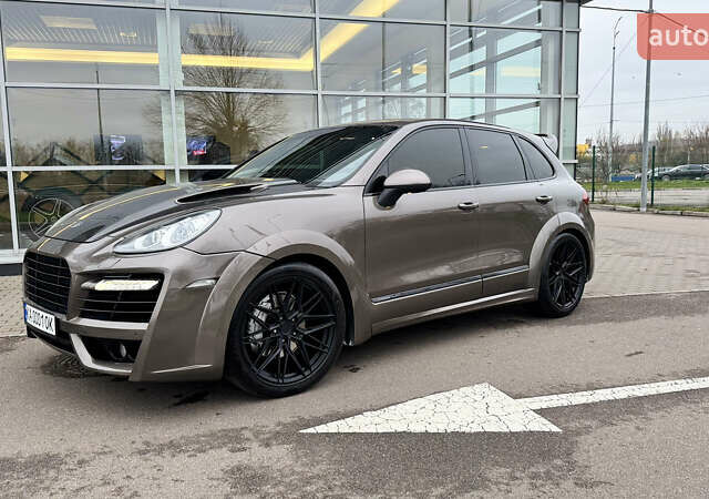 Коричневый Порше Каен, объемом двигателя 4.13 л и пробегом 162 тыс. км за 26000 $, фото 1 на Automoto.ua