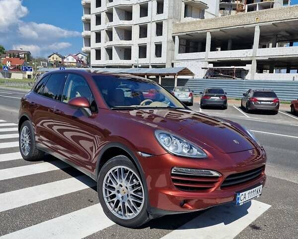 Червоний Порше Cayenne, об'ємом двигуна 3 л та пробігом 185 тис. км за 27600 $, фото 1 на Automoto.ua