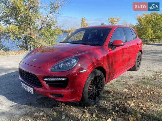 Красный Порше Каен, объемом двигателя 4.81 л и пробегом 118 тыс. км за 29900 $, фото 1 на Automoto.ua
