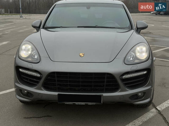 Серый Порше Каен, объемом двигателя 4.81 л и пробегом 84 тыс. км за 29999 $, фото 1 на Automoto.ua