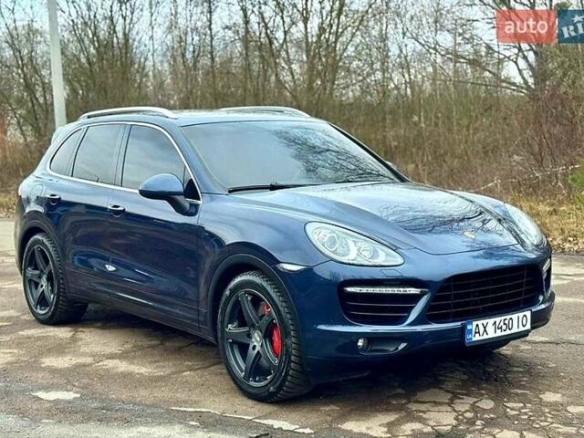 Синий Порше Каен, объемом двигателя 4.8 л и пробегом 135 тыс. км за 19999 $, фото 1 на Automoto.ua